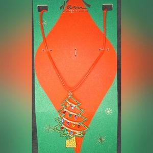 3/ $35 limited edition Christmas tree necklace by I AM